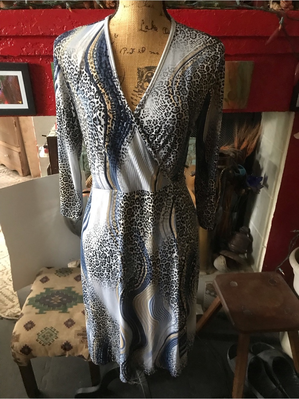 Suzie In The City dress Blue, Black,Cream Animal-Print faux Wrap calf length.
